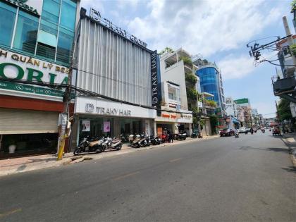 Nhà phố Huỳnh Văn Bánh PN ngang 6.5m 130m2 cấp TỨ gần chợ KD đa ngành nhỉnh 12 tỷ.