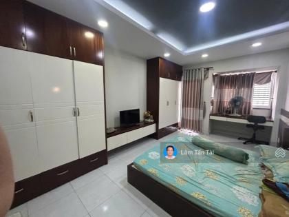 Bàn nhà Xe hơi đỗ cửa, 85m2, nở hậu, 2 mặt tiền Nguyễn Hữu Tiến, chỉ 6tỷxx