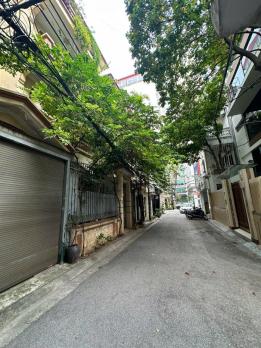 Bán Nhà P/Lô Ô Tô Tránh Quận Đống Đa 125m2-5T MT9,5m Vỉa Hè 50 Tỷ Láng Hạ.