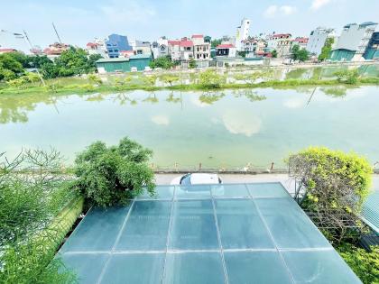 Bán Nhà VIEW HỒ Quận Long Biên 200m2-4T MT11m Vỉa Hè Tặng Nội Thất 31 Tỷ Bát Khối