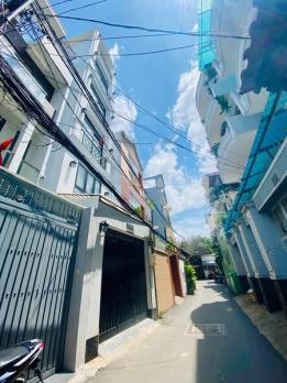 Nhà HXH Đường Nơ Trang Long Phường 7 Quận Bình Thạnh.