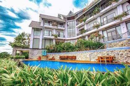 Bán GOLF VILLA-Tam Đảo 2300m2-4T Th/Máy MT30m Dòng Tiền 2,4 Tỷ/Năm 40 Tỷ Tam Đảo.