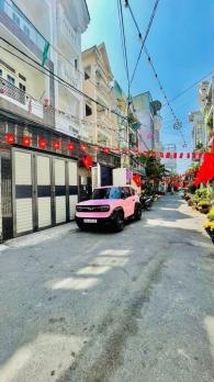 Nhà đẹp 4 lầu có hầm HXT 80m2 ngang 4m ở ngay đi bộ ra đường Quang Trung gần Emart 9.5 tỷ