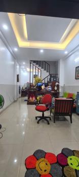 Gấp bán nhà đúc trệt 2 lầu (4x14) HXH Tân Chánh Hiệp 36, Quận 12 Giá Rẻ