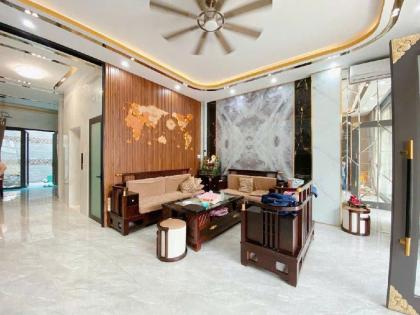 Bán nhà 7 tầng đẹp hẻm 656 Quang Trung ngang 6m có hầm T.máy ở ngay gần chợ 24 tỷ.