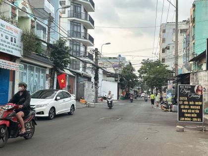 Bán nhà 4 lầu HXH Nguyễn Thái Sơn ngang 5.2m 121m2 11PN gần siêu thị Emart chỉ 12.5 tỷ.