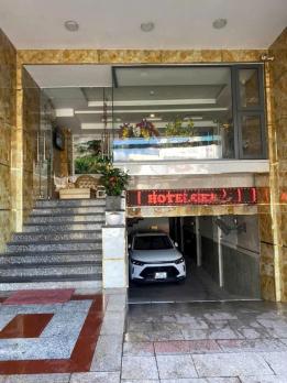 Khách sạn 7 tầng 2 sao hầm T.máy 22P 5.6m 125m2 MT gần Thống Nhất DT 180tr chỉ 23 tỷ.