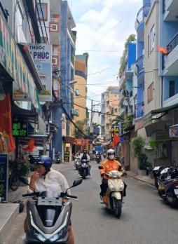 Bán gấp nhà mặt tiền Quận Phú Nhuận TP.HCM, giáp Q1, lô góc kinh doanh đỉnh, giá rẻ