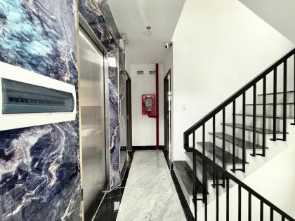 CHDV 7 lầu mới 169m2 ngang 6.5m xe du lịch tới Phạm Văn Chiêu gần chợ 30PN T.máy 29.9  tỷ.