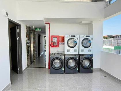 CHDV 7 lầu mới 169m2 ngang 6.5m xe du lịch tới Phạm Văn Chiêu gần chợ 30PN T.máy 29.9  tỷ.